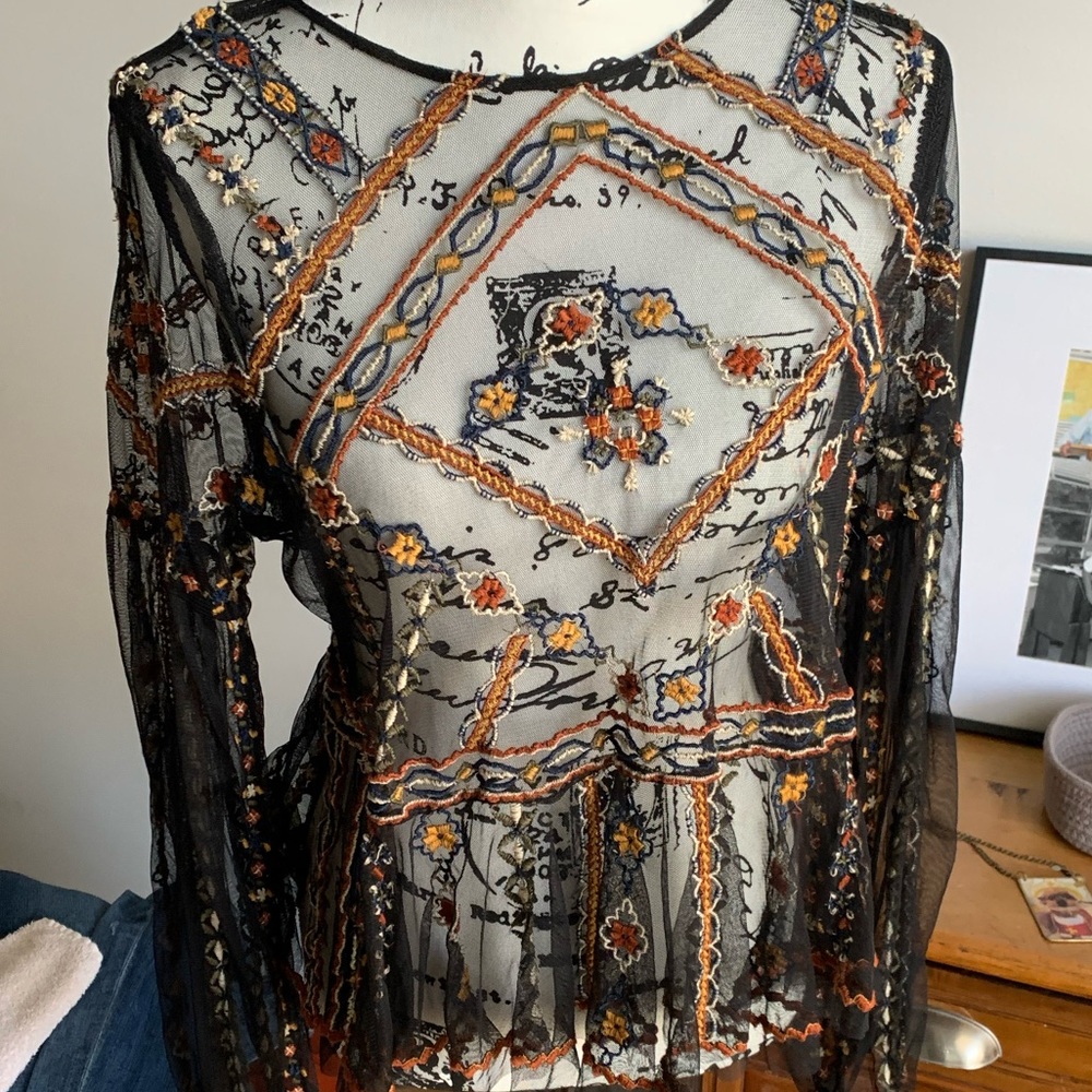 I LOVE this blouse but it never fit right on me, consequently, I wore it once.